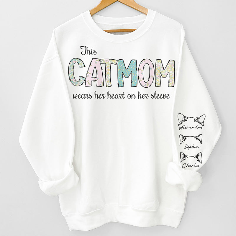 Son cœur sur sa manche - Sweat-shirt unisexe personnalisé avec motif chat sur la manche - Cadeau de Noël pour les propriétaires d'animaux et les amoureux des animaux