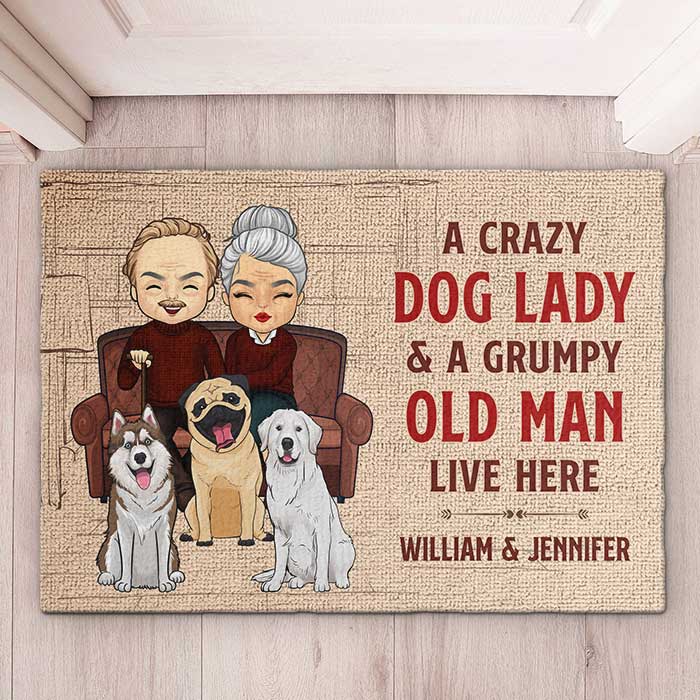 A Crazy Dog Lady And Her Grumpy Old Man Live Here - Personalized Decorative Mat.